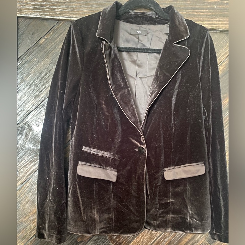 Boutique black velvet blazer, with shoulder pads.